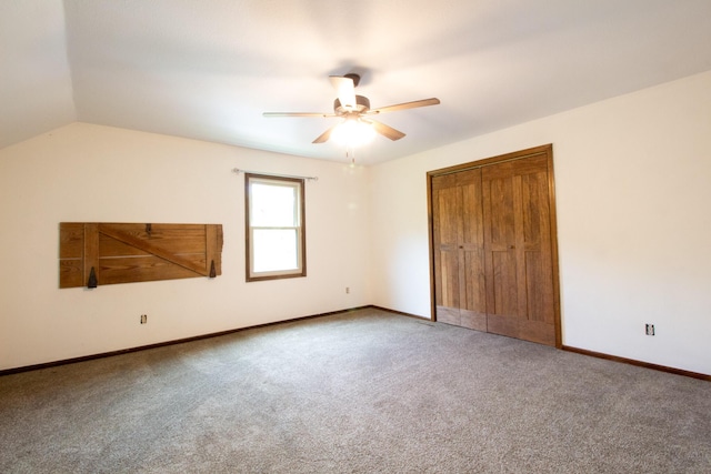 1831 E Woodbine St, Springfield, MO 65803 - unfurnished bedroom with carpet, baseboards, a closet, ceiling fan, and lofted ceiling