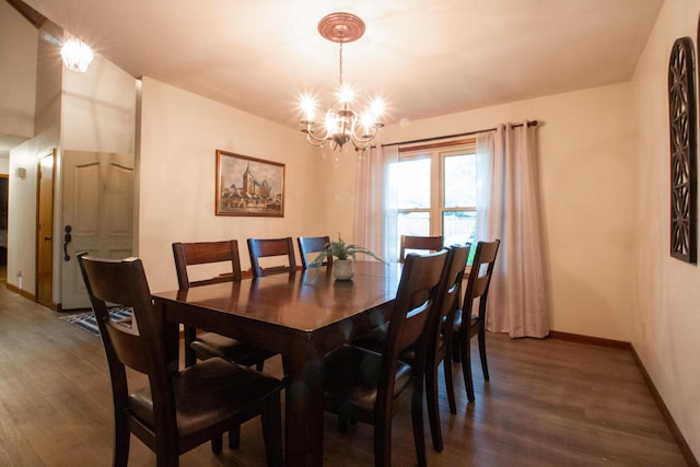1831 E Woodbine St, Springfield, MO 65803 - dining space featuring a chandelier, dark wood-style floors, and baseboards
