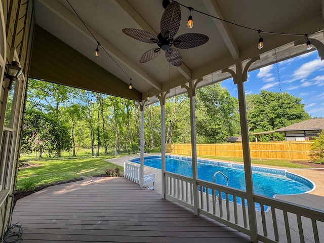 1831 E Woodbine St, Springfield, MO 65803 - wooden terrace featuring ceiling fan and view of wooded area