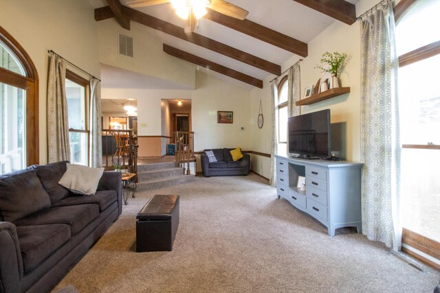 1831 E Woodbine St, Springfield, MO 65803 - living room with beamed ceiling, light carpet, a ceiling fan, and high vaulted ceiling