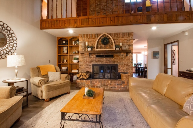 1831 E Woodbine St, Springfield, MO 65803 - living room featuring a fireplace, built in features, and a high ceiling