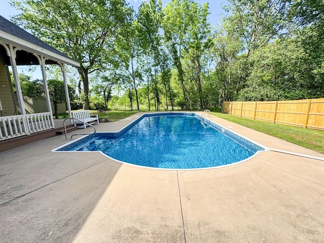 1831 E Woodbine St, Springfield, MO 65803 - view of swimming pool with a patio and view of scattered trees