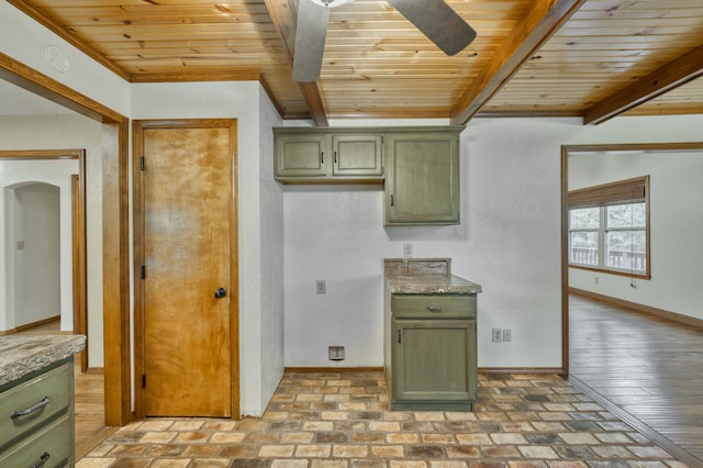 224 Loveland Dr, Rogersville, MO 65742 - kitchen with green cabinets, wood ceiling with exposed beams, baseboards, brick patterned floors, and arched walkways