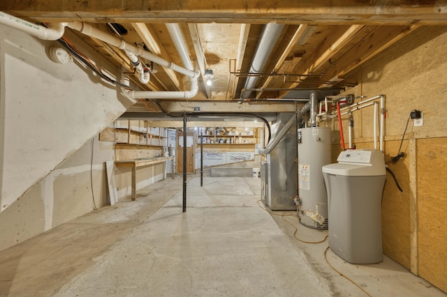 224 Loveland Dr, Rogersville, MO 65742 - unfinished below grade area with water heater, a water softener system, and heating unit
