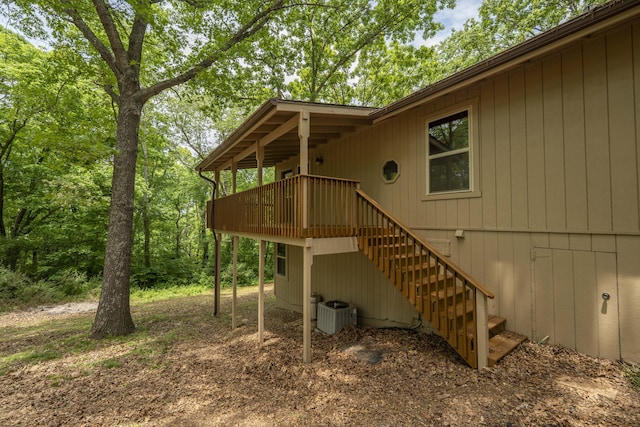 224 Loveland Dr, Rogersville, MO 65742 - view of property exterior with stairs, a wooden deck, and central AC
