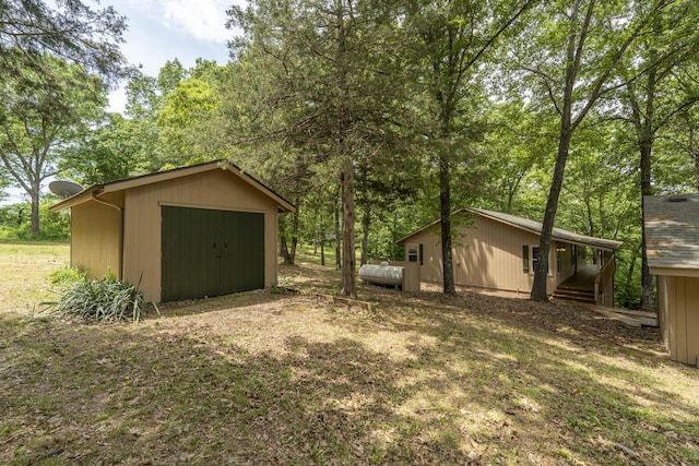 224 Loveland Dr, Rogersville, MO 65742 - garage featuring a shed
