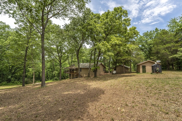 224 Loveland Dr, Rogersville, MO 65742 - view of yard with an outbuilding