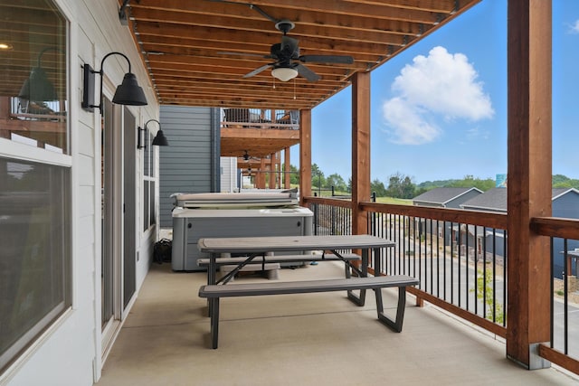232 Chateau Mountain Hilltop Way, Branson, MO 65616 - balcony with a hot tub and ceiling fan