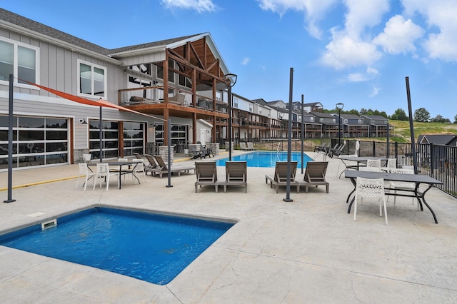 232 Chateau Mountain Hilltop Way, Branson, MO 65616 - community pool featuring a patio