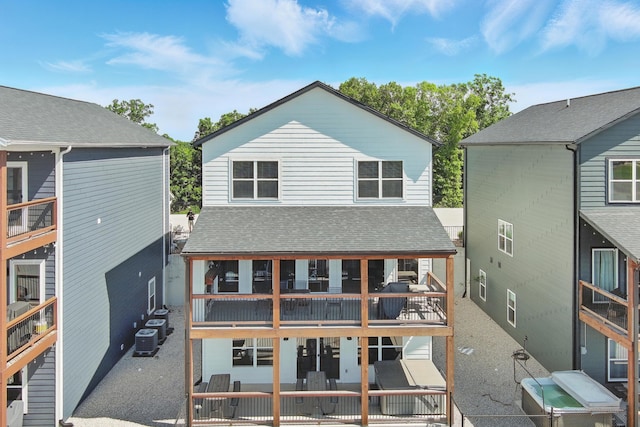 232 Chateau Mountain Hilltop Way, Branson, MO 65616 - back of house with roof with shingles, central AC unit, and a patio area