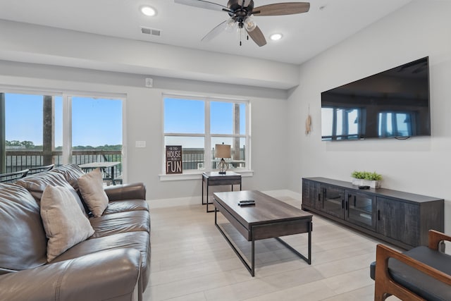 232 Chateau Mountain Hilltop Way, Branson, MO 65616 - living area featuring a ceiling fan, healthy amount of natural light, baseboards, recessed lighting, and light wood-type flooring