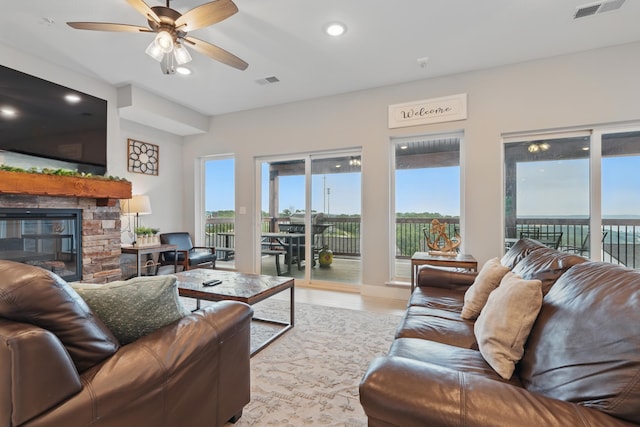 232 Chateau Mountain Hilltop Way, Branson, MO 65616 - living area featuring a ceiling fan, a fireplace, wood finished floors, and recessed lighting