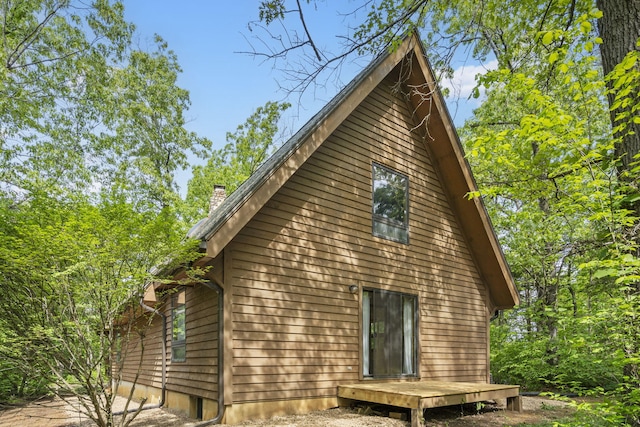 15295 S 1901st Rd, Stockton, MO 65785 - view of home's exterior featuring a chimney