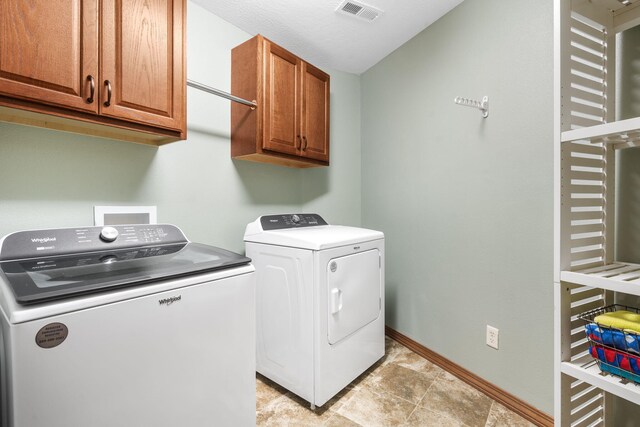 6755 W Farm Rd Unit 194, Republic, MO 65738 - washroom featuring cabinet space, washing machine and dryer, and baseboards