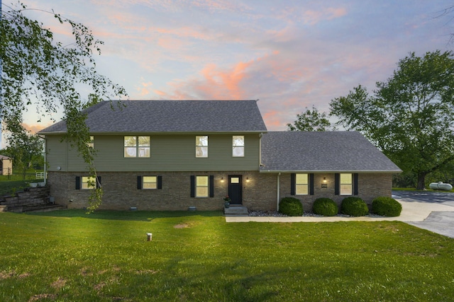 6755 W Farm Rd Unit 194, Republic, MO 65738 - colonial house featuring a front lawn and roof with shingles