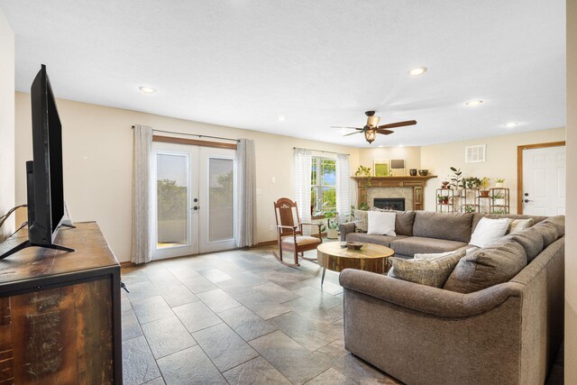 6755 W Farm Rd Unit 194, Republic, MO 65738 - living area featuring recessed lighting, french doors, ceiling fan, and a lit fireplace