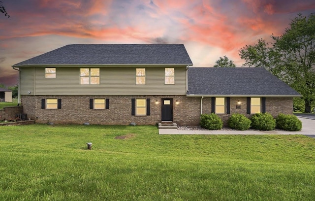 6755 W Farm Rd Unit 194, Republic, MO 65738 - view of front of house featuring a front lawn, brick siding, and a shingled roof