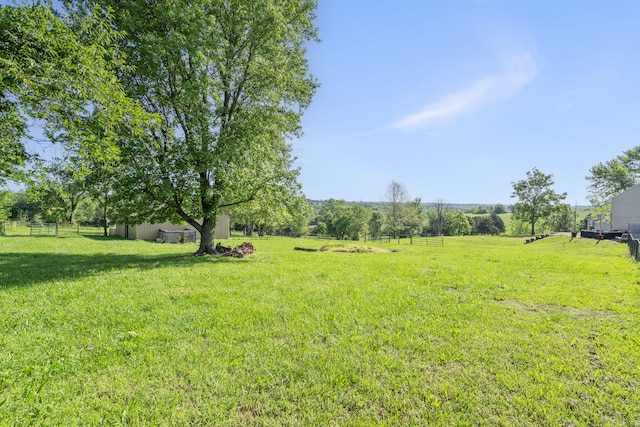6755 W Farm Rd Unit 194, Republic, MO 65738 - view of yard with a view of rural / pastoral area and an outbuilding