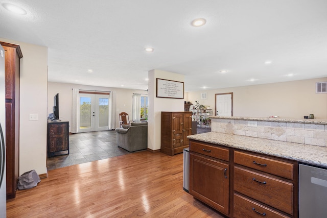 6755 W Farm Rd Unit 194, Republic, MO 65738 - kitchen featuring french doors, light wood-type flooring, recessed lighting, dishwasher, and open floor plan