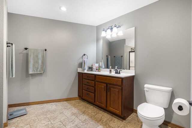 6755 W Farm Rd Unit 194, Republic, MO 65738 - bathroom with baseboards, vanity, toilet, and a shower with door