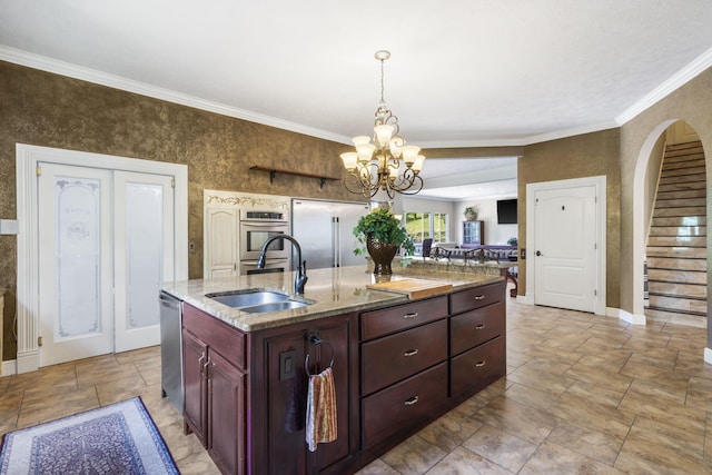 200 Barnes Ln, Branson, MO 65616 - kitchen with appliances with stainless steel finishes, a sink, stone finish flooring, light stone countertops, and crown molding