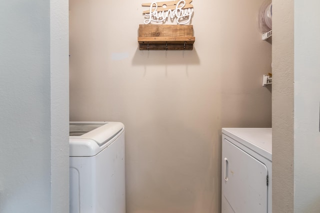 211 Spring Meadows Pkwy, Branson, MO 65616 - washroom featuring independent washer and dryer