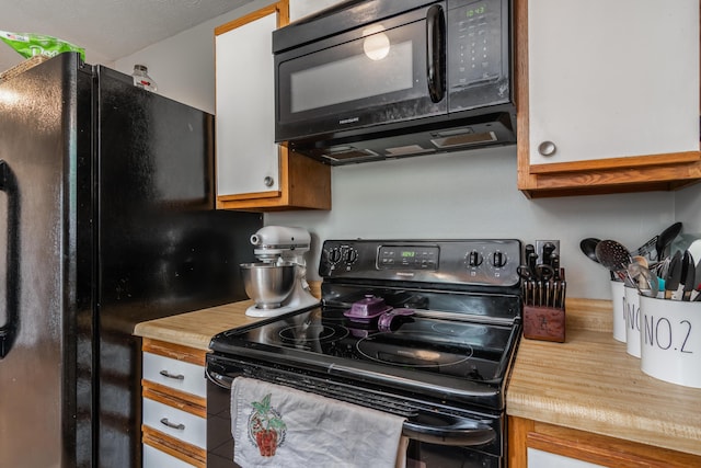 211 Spring Meadows Pkwy, Branson, MO 65616 - kitchen featuring black appliances and wooden counters