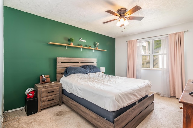 211 Spring Meadows Pkwy, Branson, MO 65616 - bedroom featuring carpet floors, a textured ceiling, baseboards, and ceiling fan