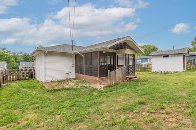 211 Spring Meadows Pkwy, Branson, MO 65616 - back of property with a sunroom and roof with shingles