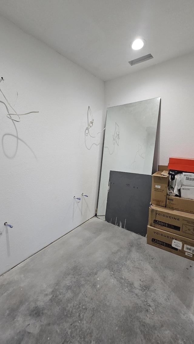 8689 County Road 7110, West Plains, MO 65775 - spare room with unfinished concrete floors