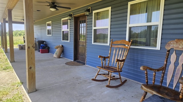 8689 County Road 7110, West Plains, MO 65775 - porch featuring a ceiling fan