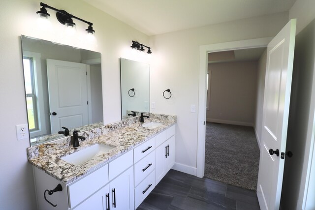 3419 S Suburban Ave, Springfield, MO 65807 - full bath featuring double vanity and baseboards