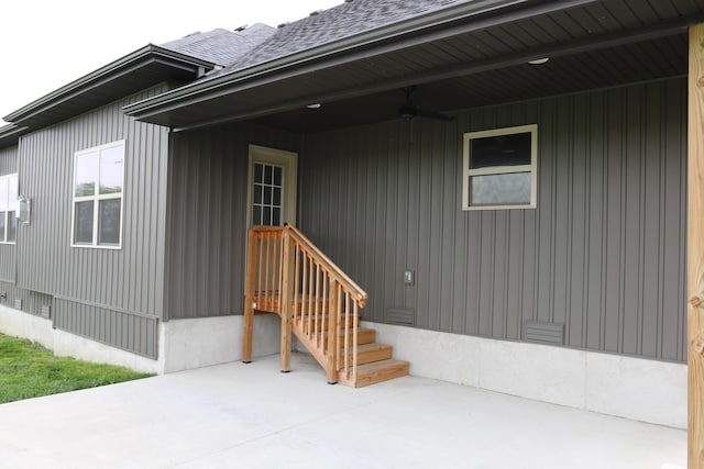 3419 S Suburban Ave, Springfield, MO 65807 - property entrance with ceiling fan, a patio, and a shingled roof