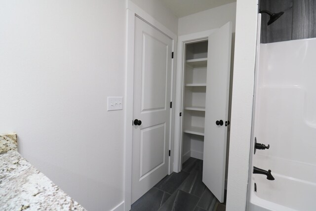 3419 S Suburban Ave, Springfield, MO 65807 - full bath with vanity, shower / tub combination, and tile patterned floors