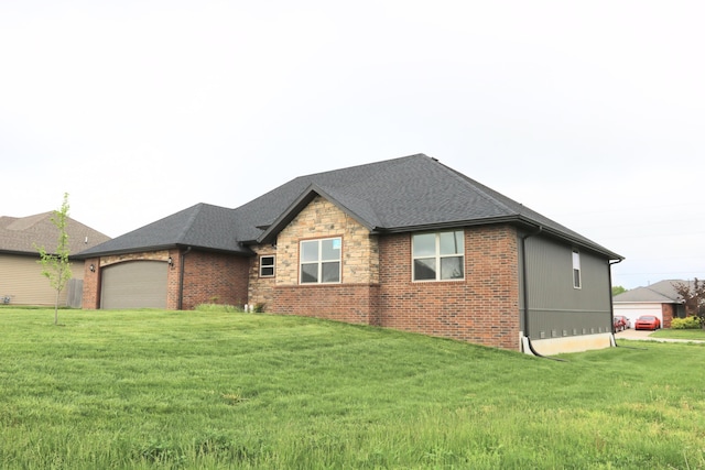 3419 S Suburban Ave, Springfield, MO 65807 - view of front of property with an attached garage, brick siding, and a front yard
