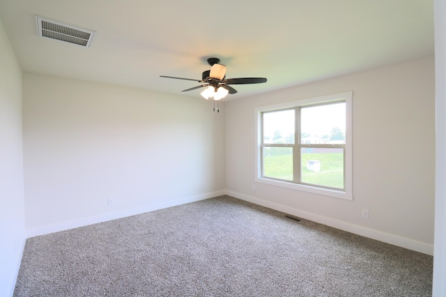 3419 S Suburban Ave, Springfield, MO 65807 - empty room featuring carpet flooring, ceiling fan, and baseboards
