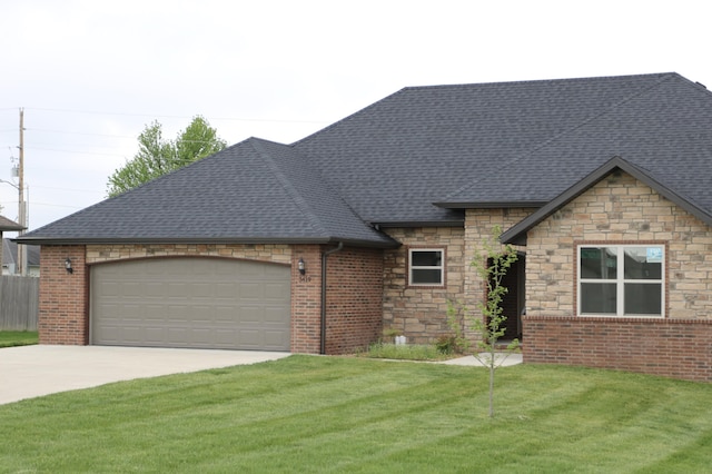 3419 S Suburban Ave, Springfield, MO 65807 - french country home featuring driveway, a garage, a front lawn, and roof with shingles