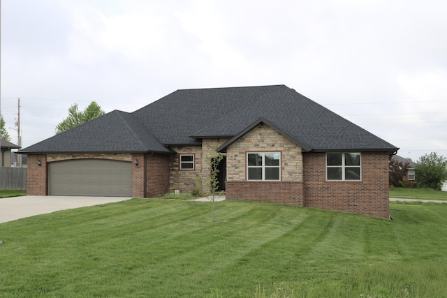 3419 S Suburban Ave, Springfield, MO 65807 - view of front of home with driveway, a garage, roof with shingles, and a front lawn