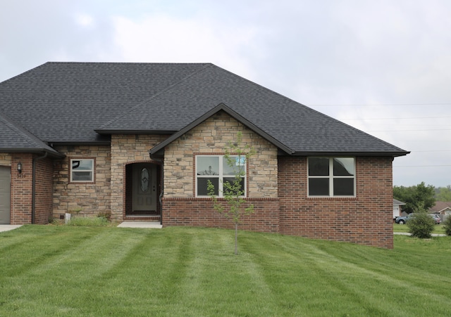 3419 S Suburban Ave, Springfield, MO 65807 - view of front of home featuring stone siding, a shingled roof, a front yard, a garage, and brick siding