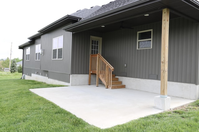 3419 S Suburban Ave, Springfield, MO 65807 - back of house with a yard, a patio area, and roof with shingles