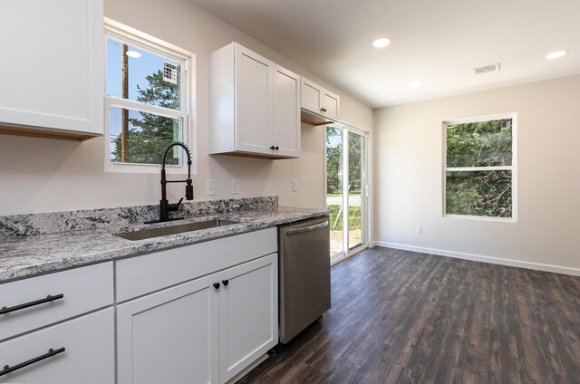 281 N 2nd St, Verona, MO 65769 - kitchen featuring dishwasher, a sink, dark wood-style floors, white cabinetry, and light stone countertops