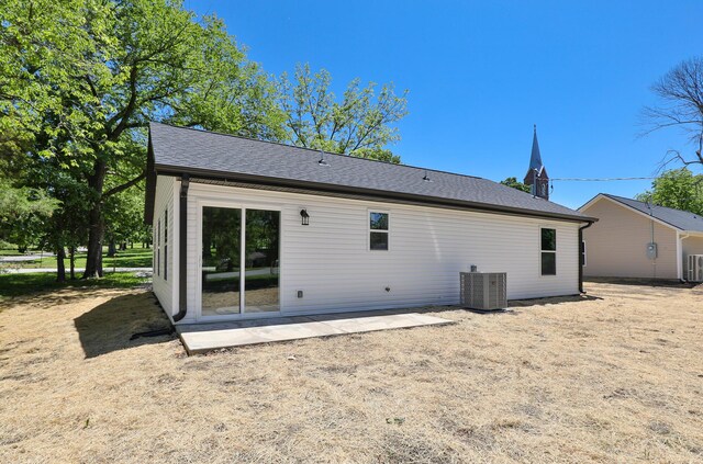 281 N 2nd St, Verona, MO 65769 - rear view of house featuring central air condition unit