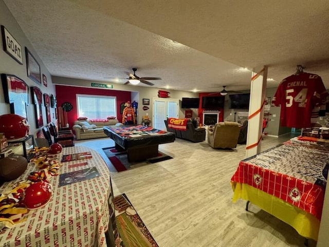 1054 W Itaska Rd, Nixa, MO 65714 - playroom featuring ceiling fan and a textured ceiling