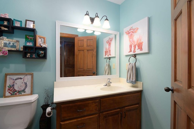 1054 W Itaska Rd, Nixa, MO 65714 - bathroom featuring vanity and toilet
