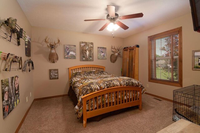 1054 W Itaska Rd, Nixa, MO 65714 - carpeted bedroom with baseboards and ceiling fan