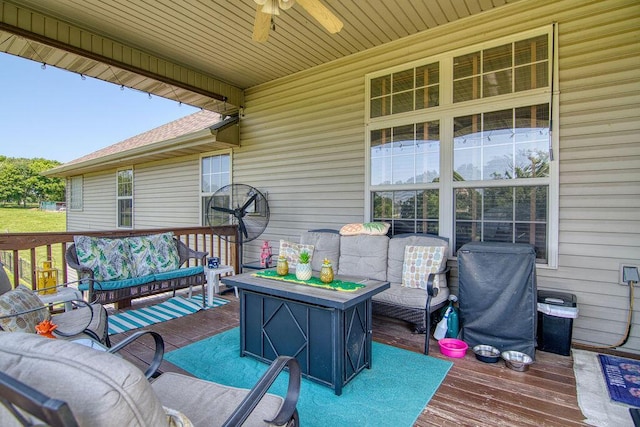 1054 W Itaska Rd, Nixa, MO 65714 - deck with outdoor lounge area and a ceiling fan