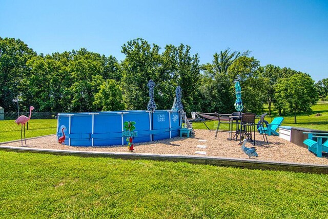 1054 W Itaska Rd, Nixa, MO 65714 - view of jungle gym featuring an outdoor pool