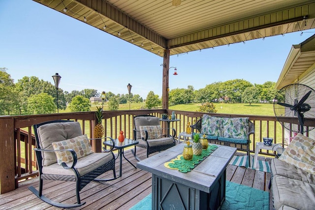 1054 W Itaska Rd, Nixa, MO 65714 - wooden terrace featuring an outdoor hangout area, view of scattered trees, and a yard