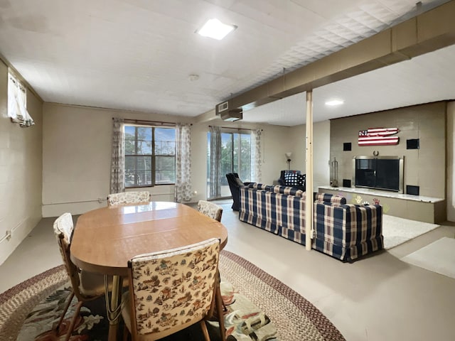 26225 Farm Rd Unit 1209, Eagle Rock, MO 65641 - dining space with concrete floors