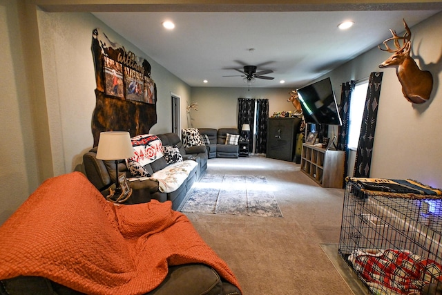 511 C St, Deepwater, MO 64740 - carpeted living room with a ceiling fan and recessed lighting